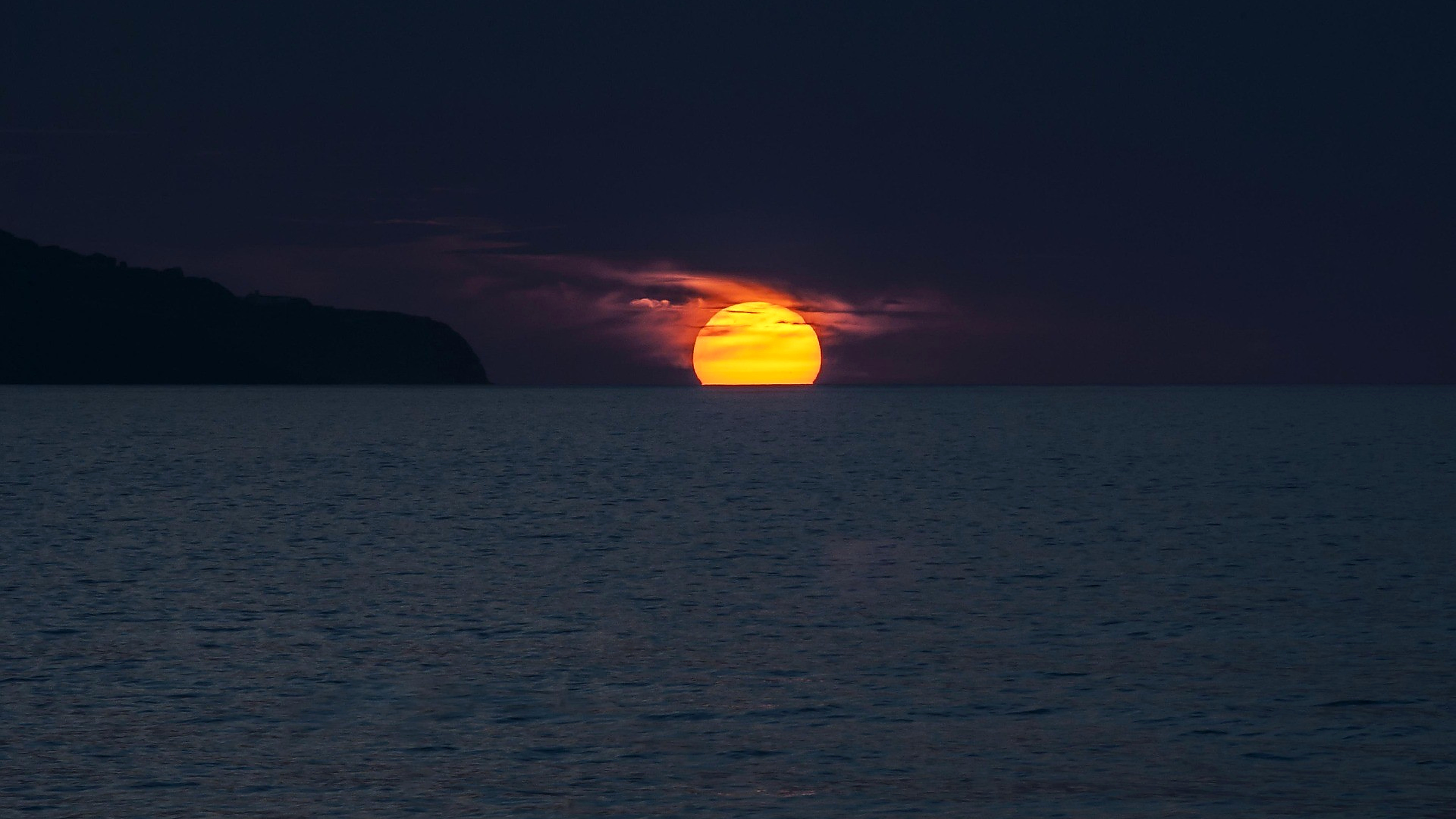 Golden sunset over the Indian Ocean during a private Mauritius sunset cruise