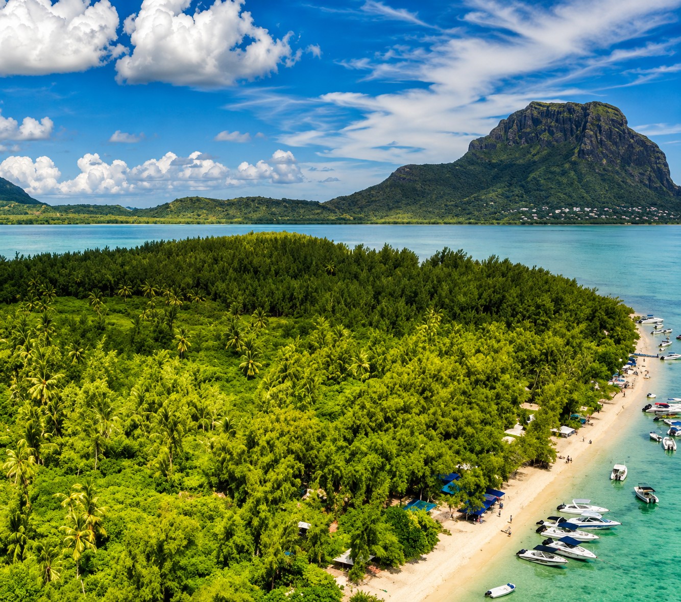 Aerial view of Ile aux Bénitiers with turquoise lagoon and Le Morne